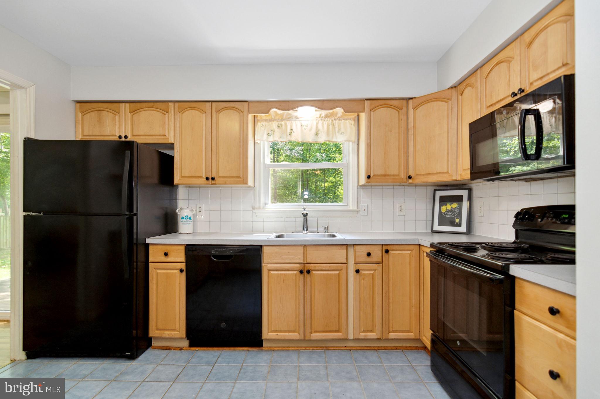 2567 Garrisonville Road Stafford, VA 22556 - Photo 14 of 56 natural wood cabinets