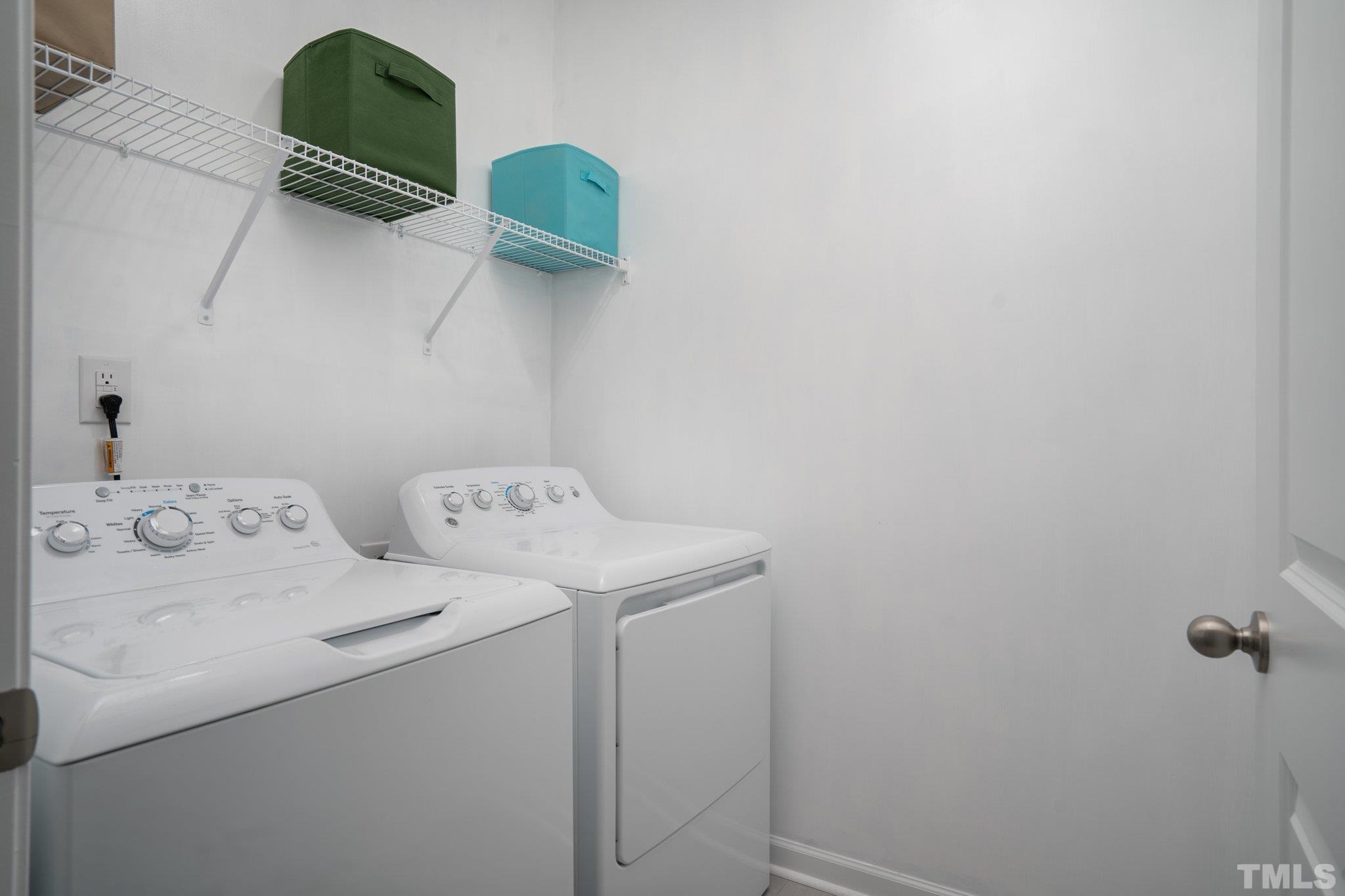 369 Lothian Rocky Mount, NC 27804 - Photo 20 of 32 a utility room with dryer and washer