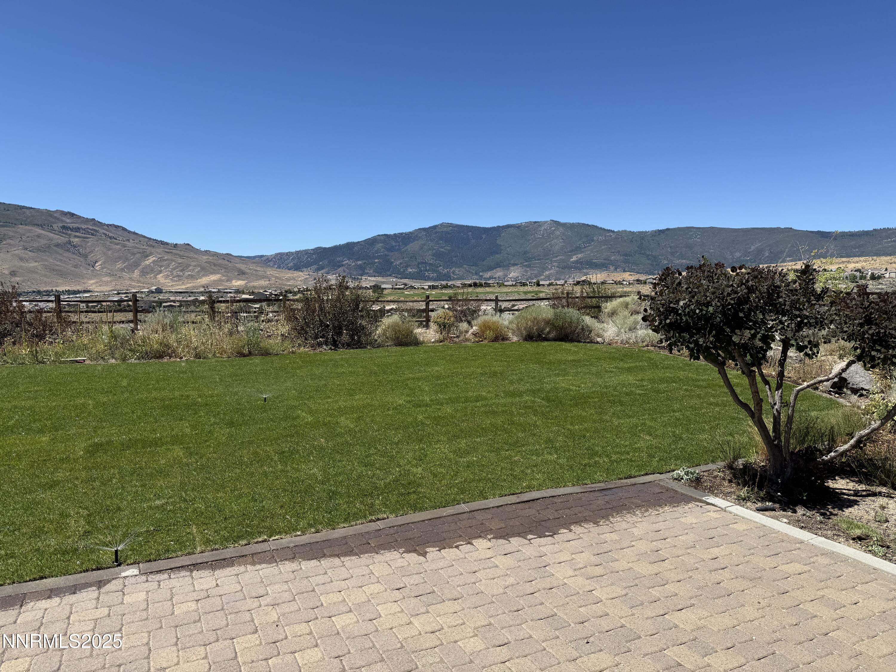 1925 Bechtol Ridge Circle Reno, NV 89523 - Photo 3 of 4 a view of a backyard with a garden