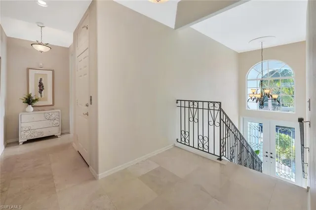 a view of hallway with livingroom