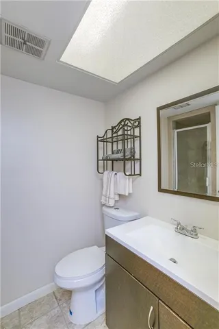 a view of a house with a yard and plants