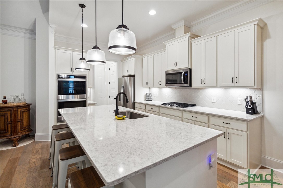 12 Golf Drive Pooler, GA 31322 - Photo 11 of 50 The island has sitting room for at least four.