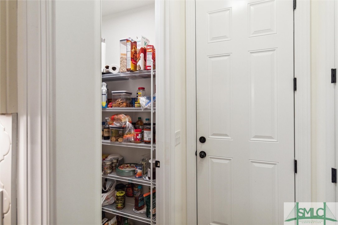 12 Golf Drive Pooler, GA 31322 - Photo 15 of 50 A spacious walk-in pantry is located between the k