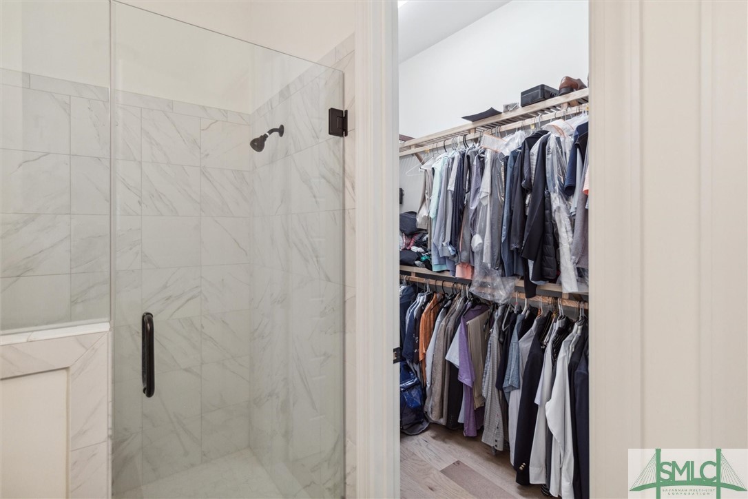 12 Golf Drive Pooler, GA 31322 - Photo 24 of 50 The primary closet is deep with wood racks and she