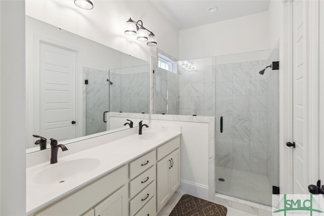 12 Golf Drive Pooler, GA 31322 - Photo 28 of 50 The walk in shower has a bench seat under the wind