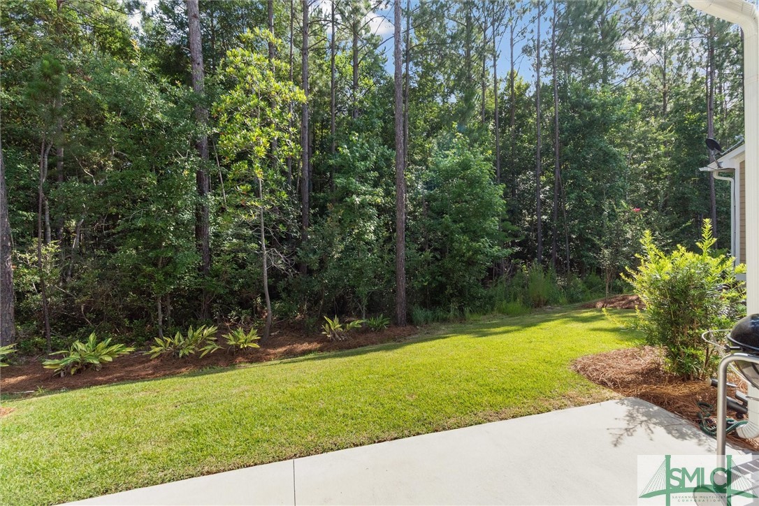 12 Golf Drive Pooler, GA 31322 - Photo 35 of 50 The wooded area behind the home is protected and c