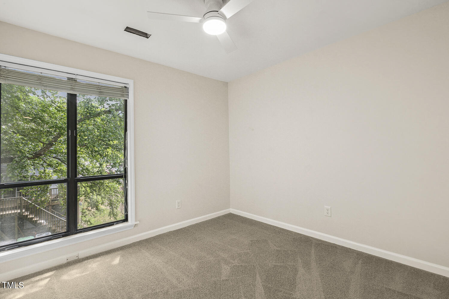 120 Joanne Circle Cary, NC 27513 - Photo 26 of 34 an empty room with a window