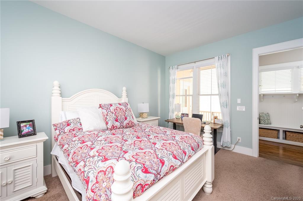 413 Hollyhock Lane Fort Mill, SC 29708 - Photo 16 of 29 a bedroom with a large bed and a table