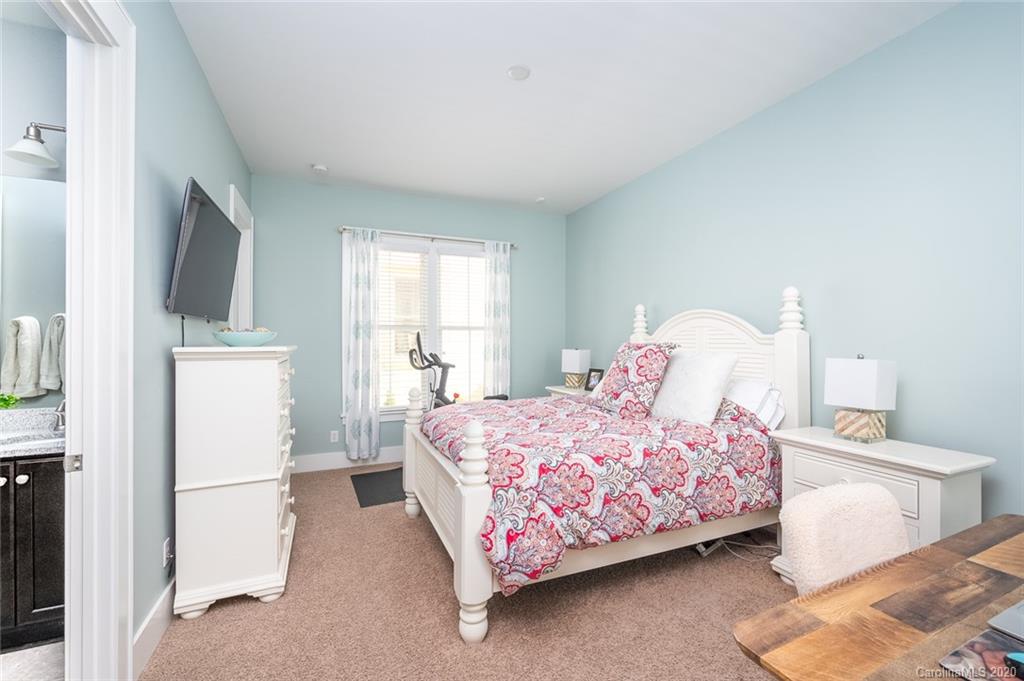 413 Hollyhock Lane Fort Mill, SC 29708 - Photo 17 of 29 a bedroom with a bed and a window