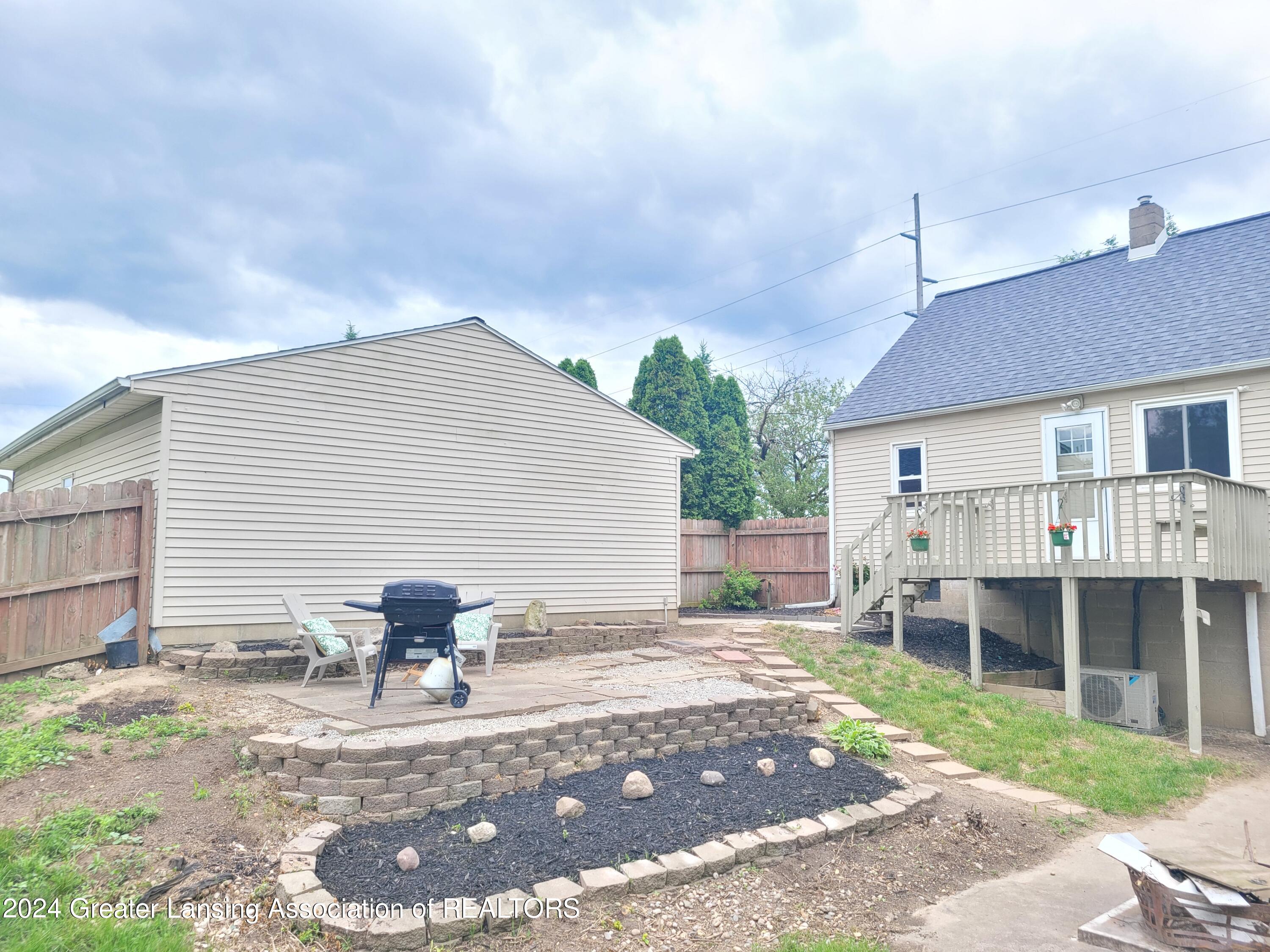 4509 North Aurelius Road Lansing, MI 48910 - Photo 4 of 33 20240607_121939