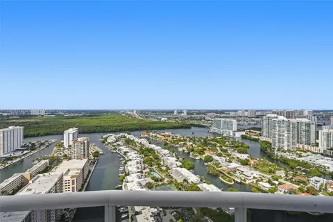 a room with a sink and cabinets