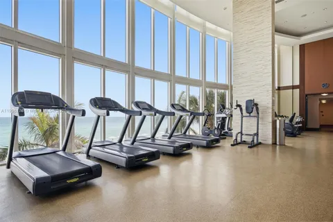 a bathroom with a shower and a tub