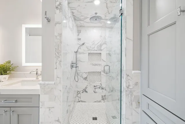 a bathroom with a sink and a mirror