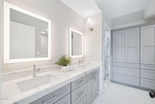 a bathroom with a bathtub and a toilet