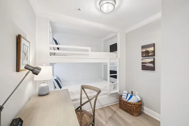 a close view of light fixtures and wooden floor