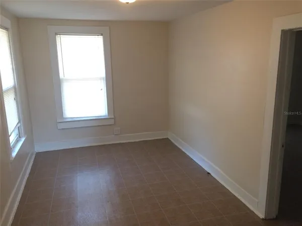 a bathroom with a sink and vanity