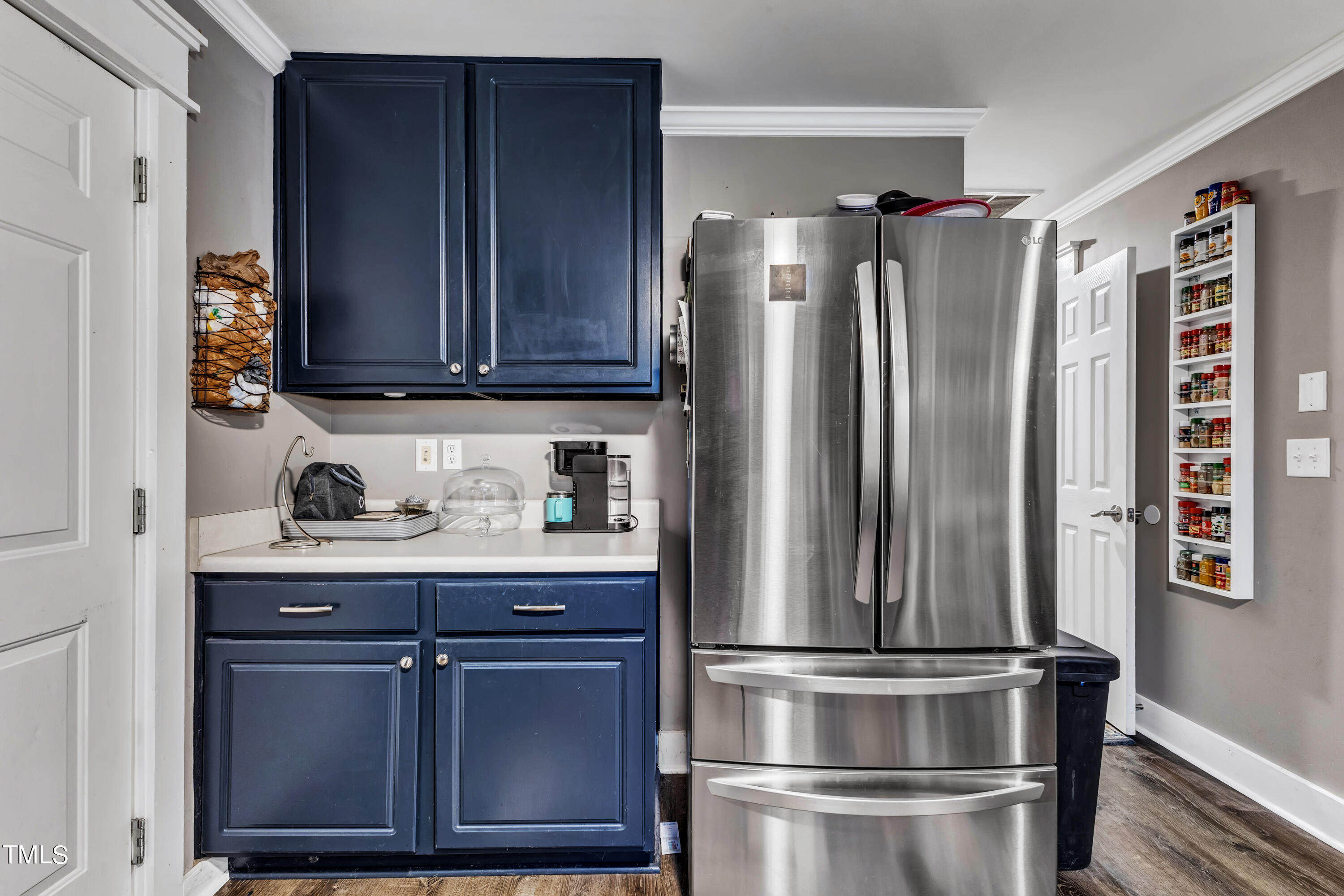 7 Epping Court Durham, NC 27703 - Photo 11 of 35 a kitchen with stainless steel appliances granite countertop a refrigerator and a stove top oven