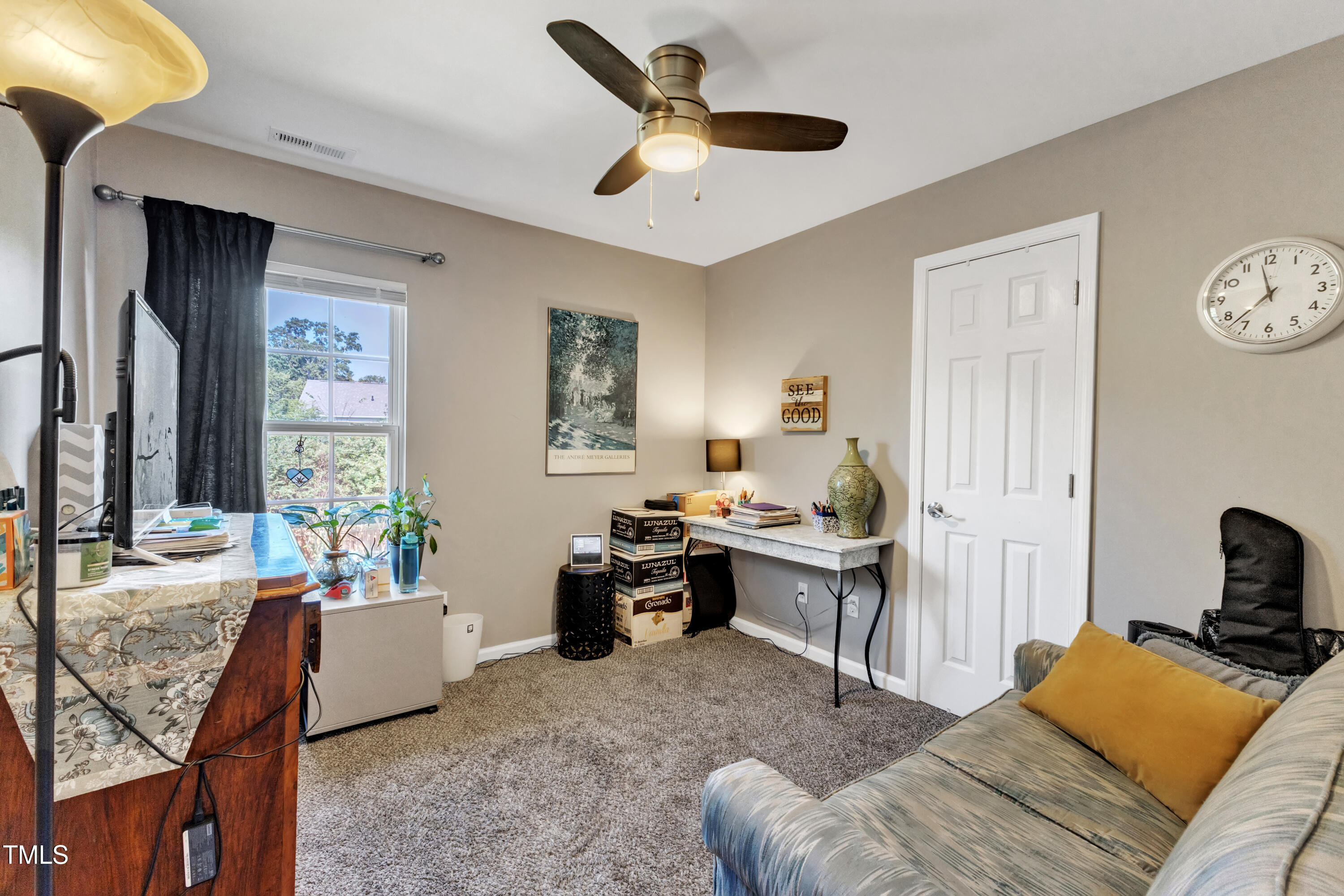 7 Epping Court Durham, NC 27703 - Photo 18 of 35 a living room with furniture kitchen view and a window