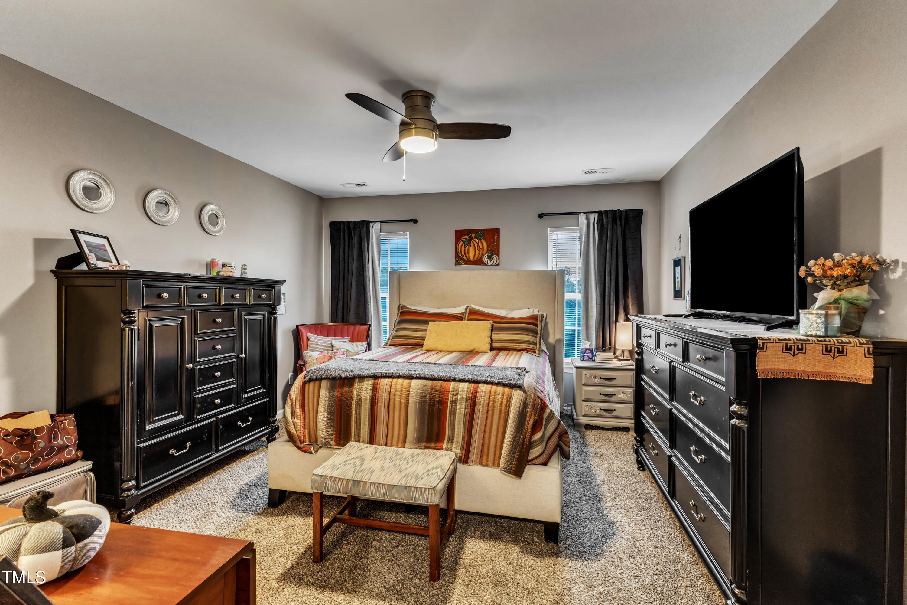 7 Epping Court Durham, NC 27703 - Photo 21 of 35 a living room with furniture and a flat screen tv
