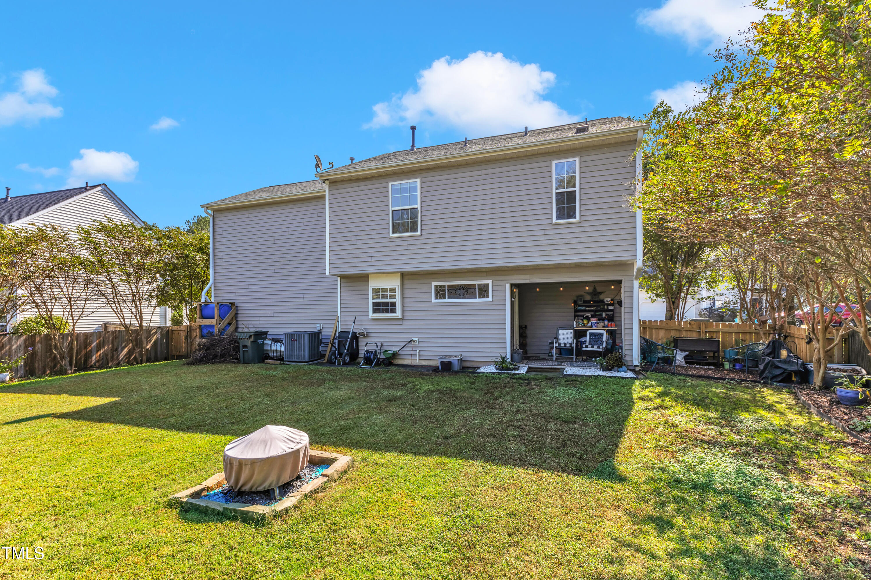 7 Epping Court Durham, NC 27703 - Photo 22 of 35 a view of a house with a yard porch and sitting area