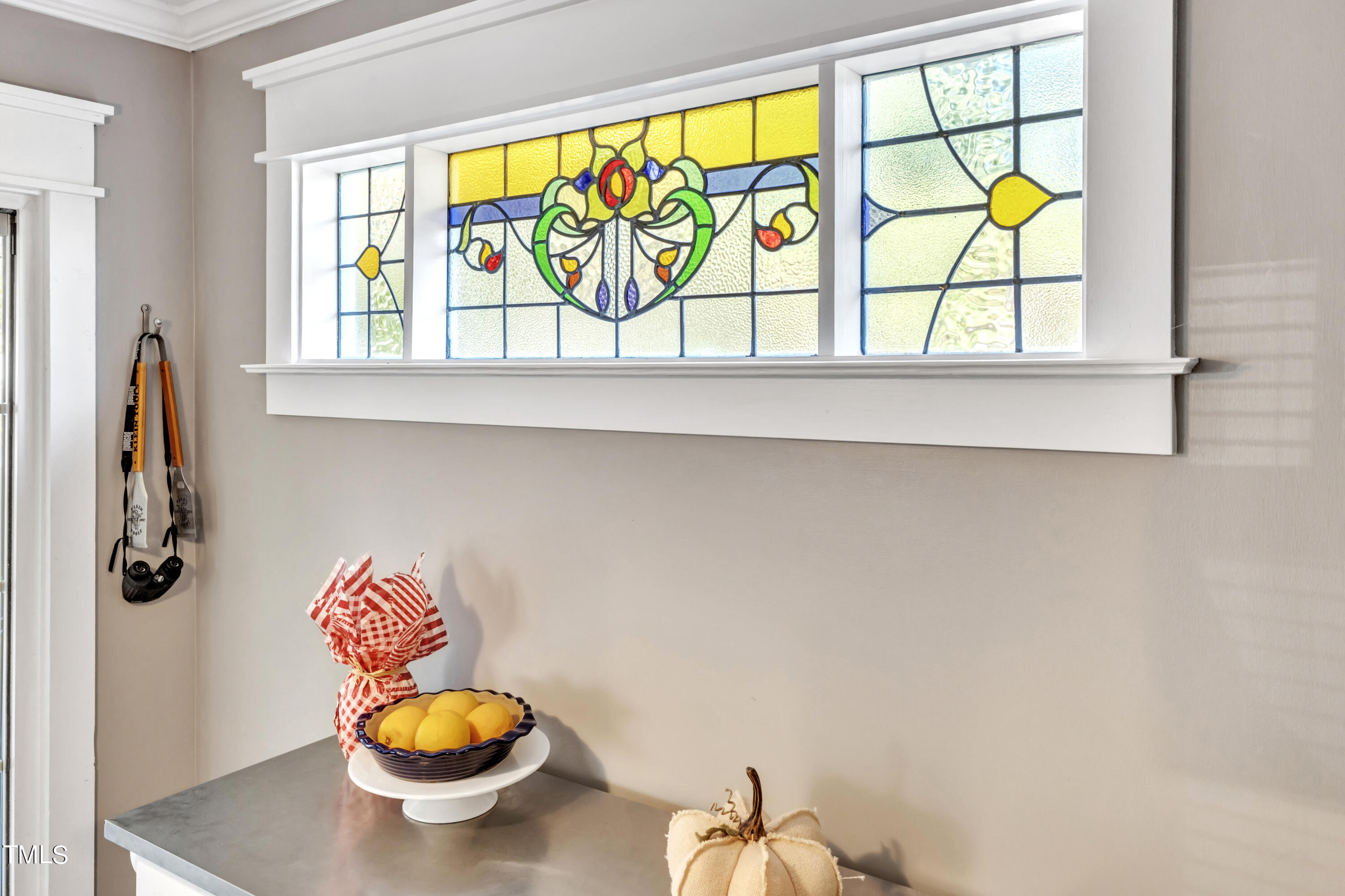 7 Epping Court Durham, NC 27703 - Photo 8 of 35 a bathroom with a sink a toilet and a window