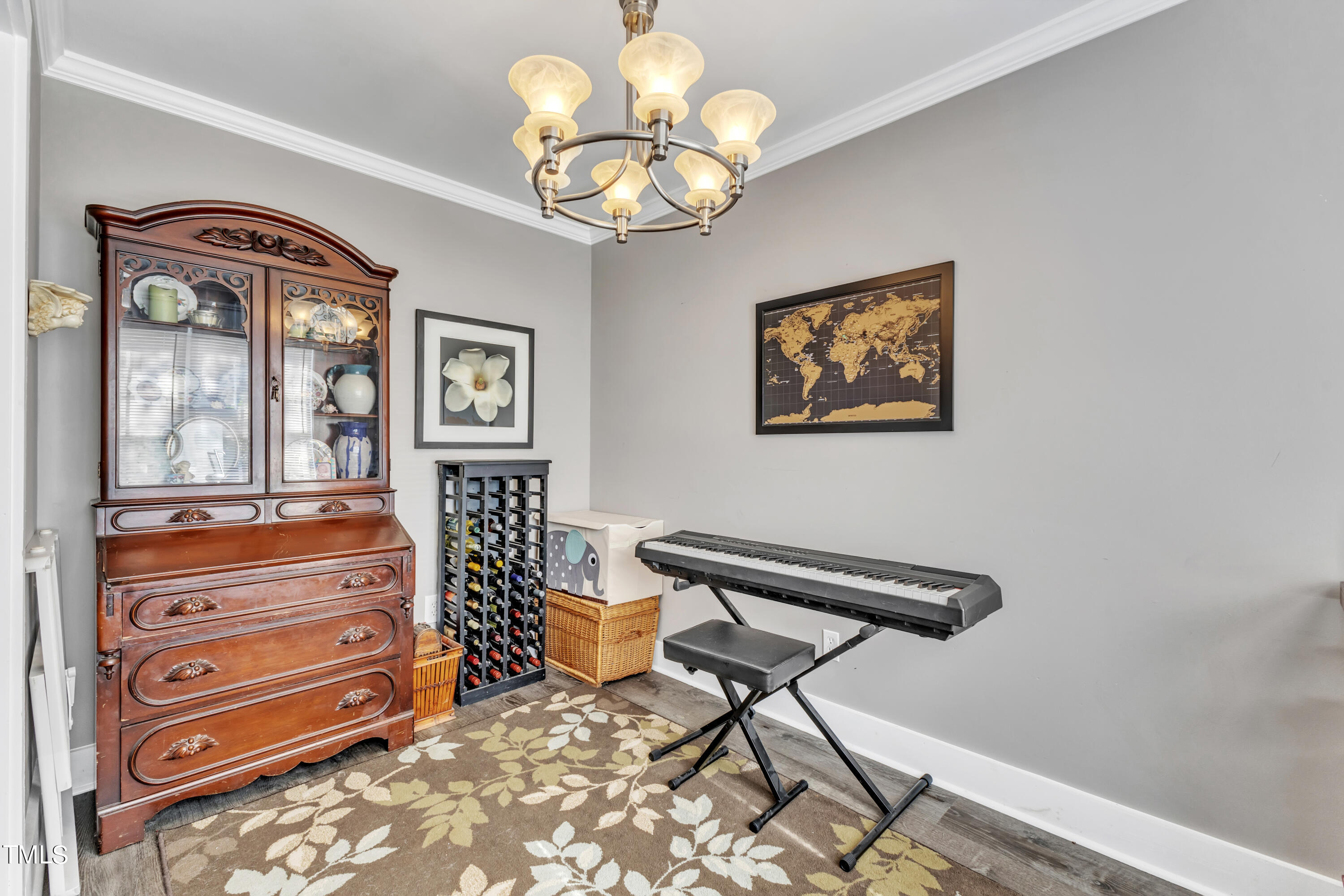 7 Epping Court Durham, NC 27703 - Photo 9 of 35 a view of a workspace with furniture and a chandelier