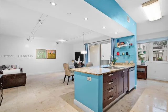 a kitchen with a stove and a refrigerator