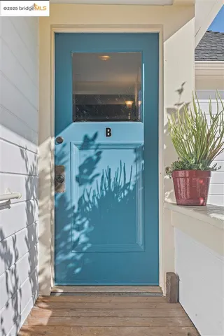 a view of fireplace with wooden floor