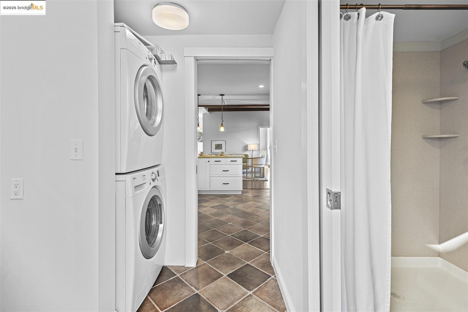 2439 Tenth Street, Unit B Berkeley, CA 94710 - Photo 13 of 16 a utility room with dryer and washer