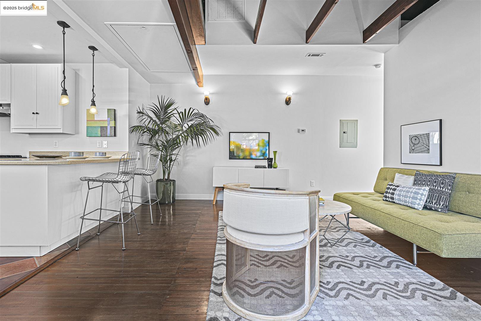 2439 Tenth Street, Unit B Berkeley, CA 94710 - Photo 6 of 16 a living room with furniture and wooden floor
