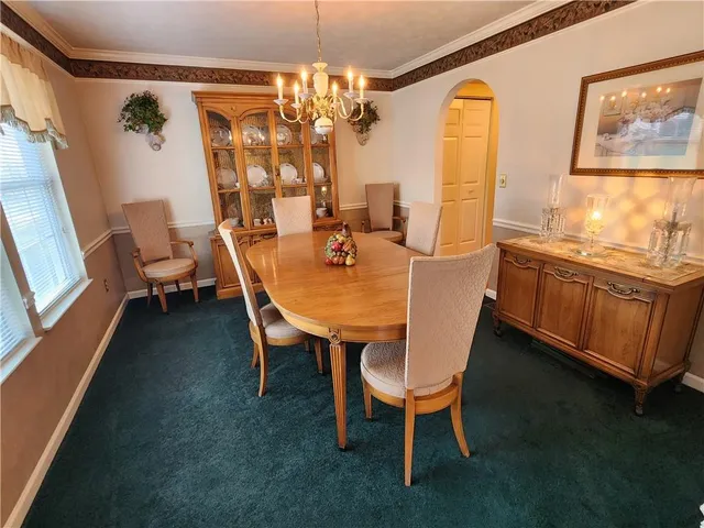 a bed room with a bed and a window