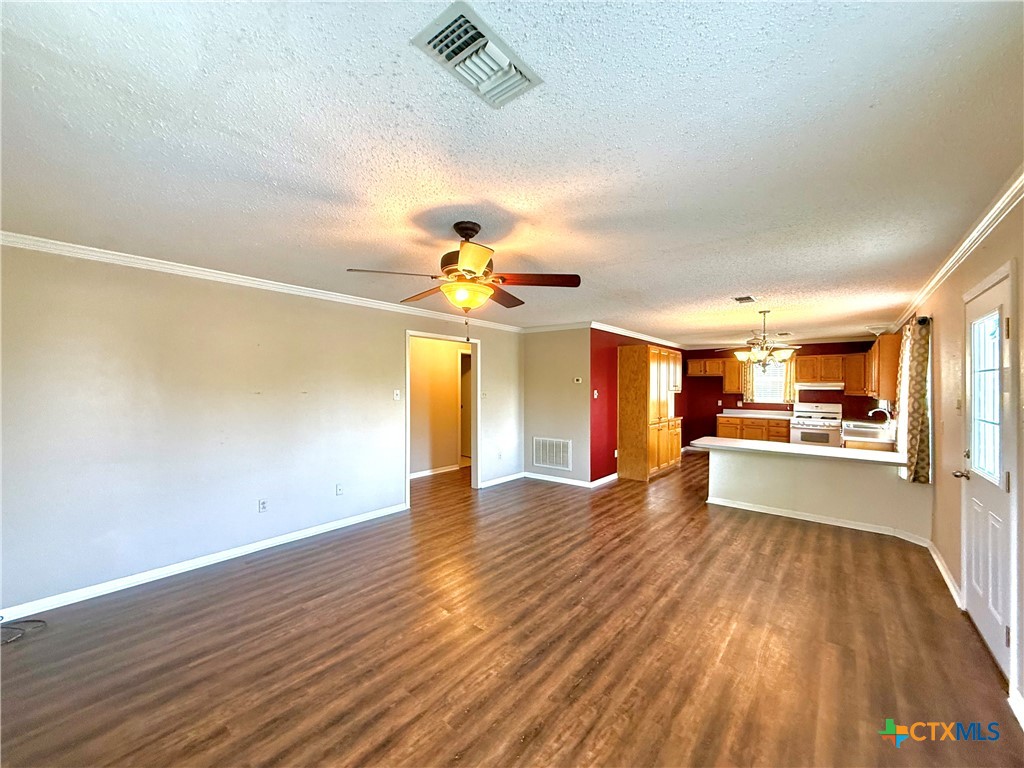 109 River Road Tivoli, TX 77990 - Photo 15 of 39 a view of a kitchen with wooden floor