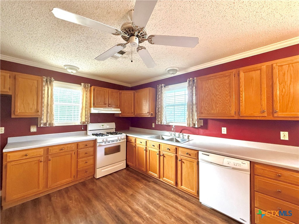 109 River Road Tivoli, TX 77990 - Photo 20 of 39 a kitchen with a sink cabinets and window