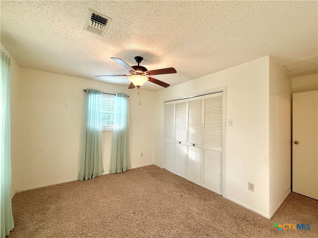 109 River Road Tivoli, TX 77990 - Photo 27 of 39 a view of a livingroom with a chandelier fan