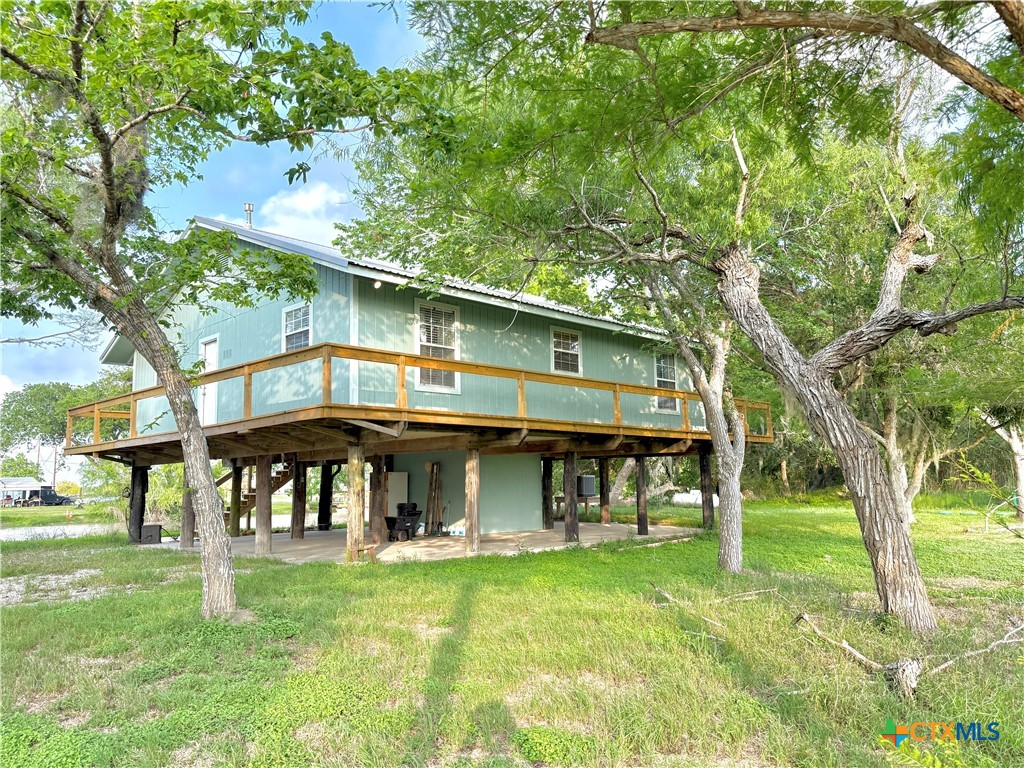 109 River Road Tivoli, TX 77990 - Photo 36 of 39 a view of an house with backyard porch and sitting area