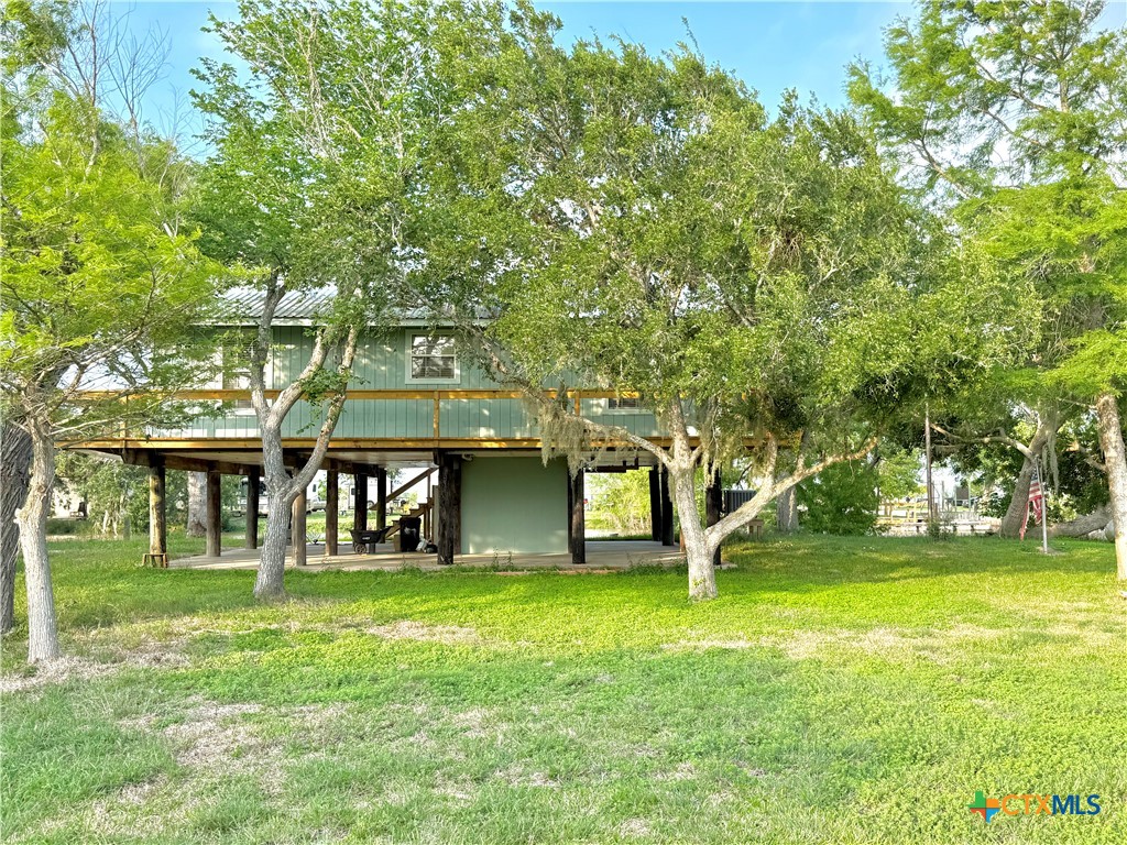 109 River Road Tivoli, TX 77990 - Photo 37 of 39 a front view of a house with garden