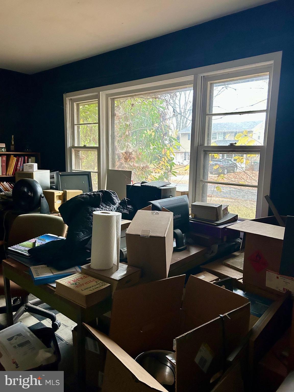 11 Mitchell Circle Newark, DE 19713 - Photo 6 of 9 a living room with furniture a large window and a table