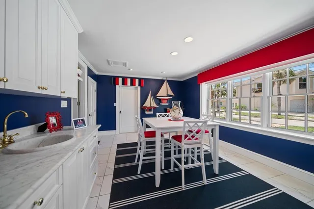 a bathroom with a sink a toilet a mirror and shower