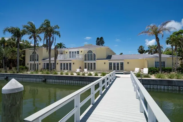 a view of a house with porch and sitting area