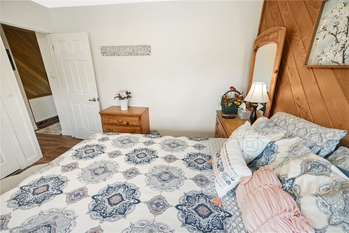 150 Evergreen Road, Unit C303 Dillon, CO 80435 - Photo 25 of 35 a bedroom with a bed and a flat tv screen on dresser