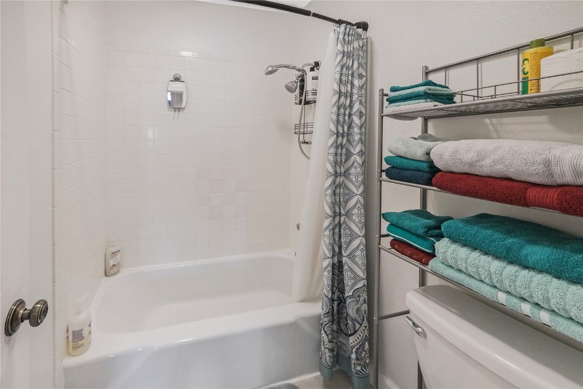 150 Evergreen Road, Unit C303 Dillon, CO 80435 - Photo 29 of 35 a bathroom with a bathtub and shower
