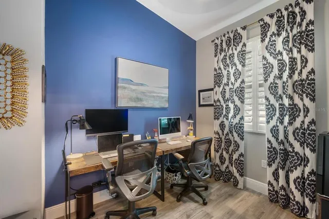 a view of a workspace with furniture