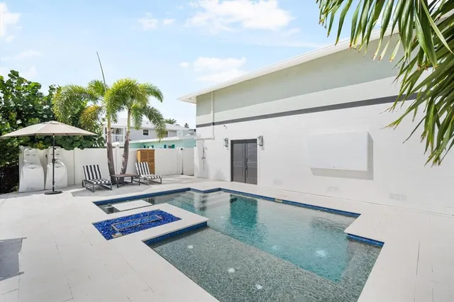 a room with a table and chairs
