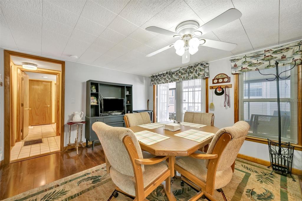 132 West St Lucia Loop Apollo Beach, FL 33572 - Photo 14 of 57 a view of a dining room with furniture window and outside view
