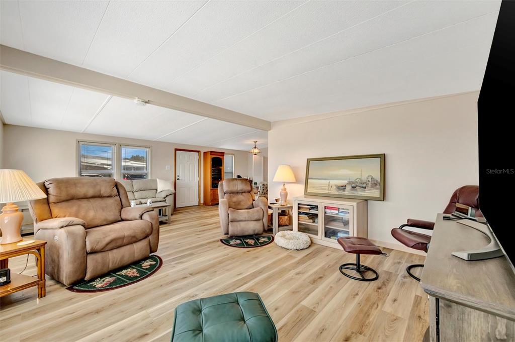 132 West St Lucia Loop Apollo Beach, FL 33572 - Photo 22 of 57 a living room with furniture and a wooden floor