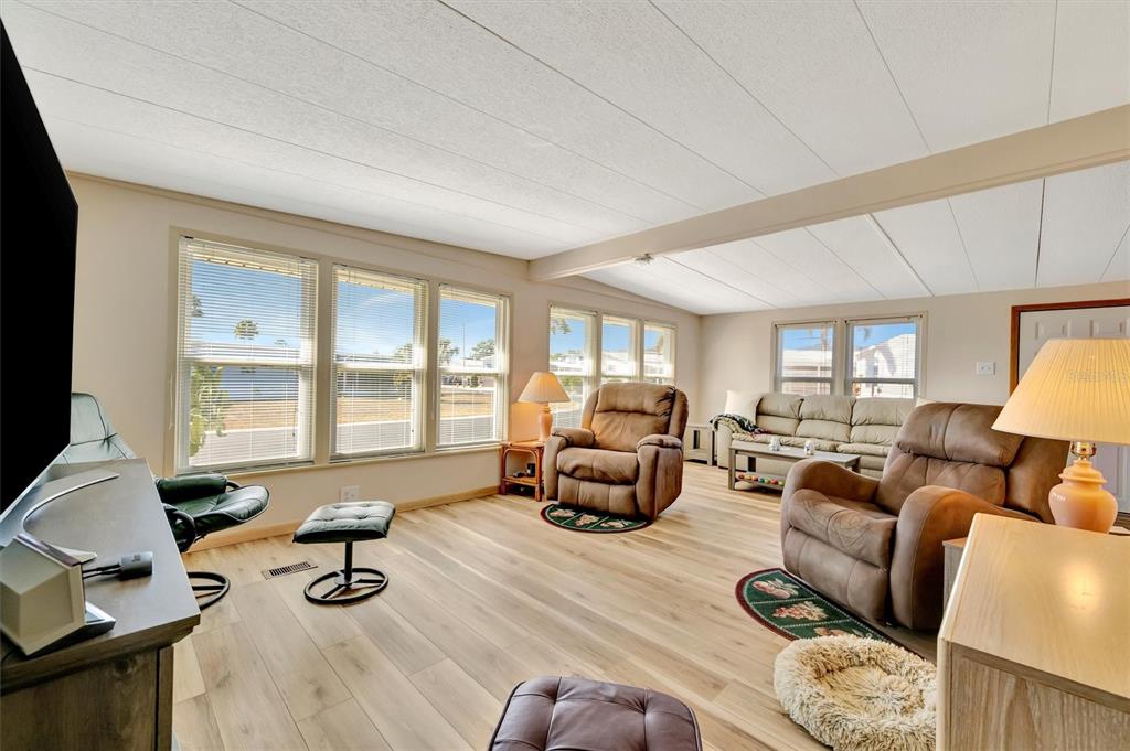 132 West St Lucia Loop Apollo Beach, FL 33572 - Photo 23 of 57 a living room with furniture and a large window