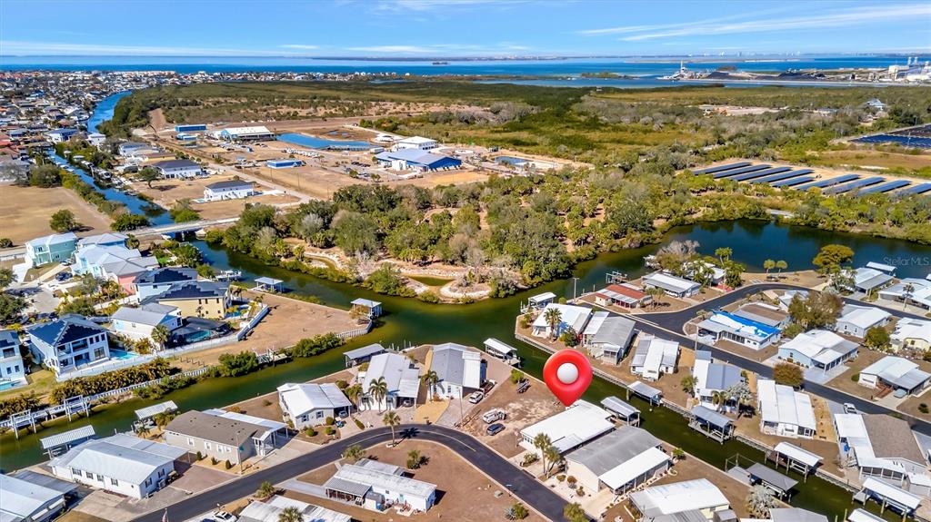 132 West St Lucia Loop Apollo Beach, FL 33572 - Photo 3 of 57 an aerial view of residential houses with outdoor space