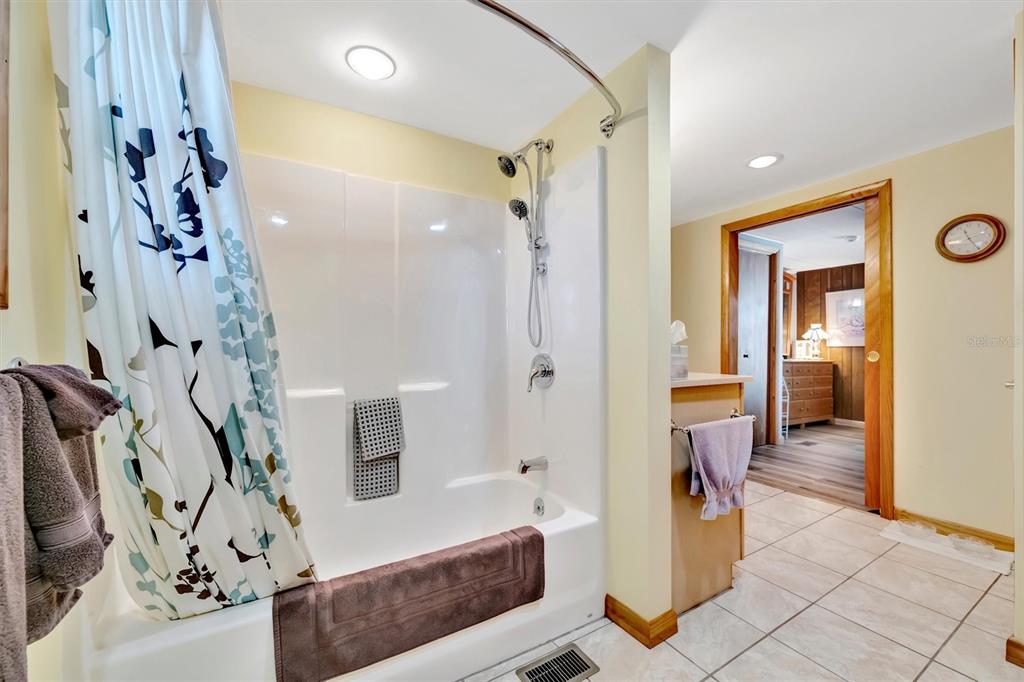 132 West St Lucia Loop Apollo Beach, FL 33572 - Photo 32 of 57 a view of a hallway and a livingroom with furniture