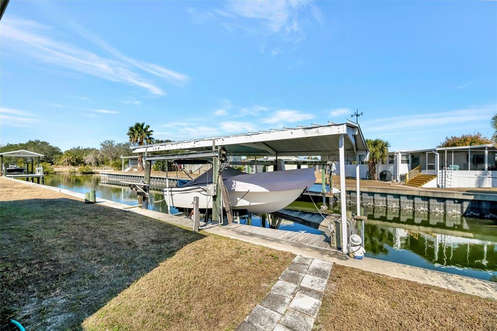 132 West St Lucia Loop Apollo Beach, FL 33572 - Photo 35 of 57 a view of a house with backyard porch and sitting area