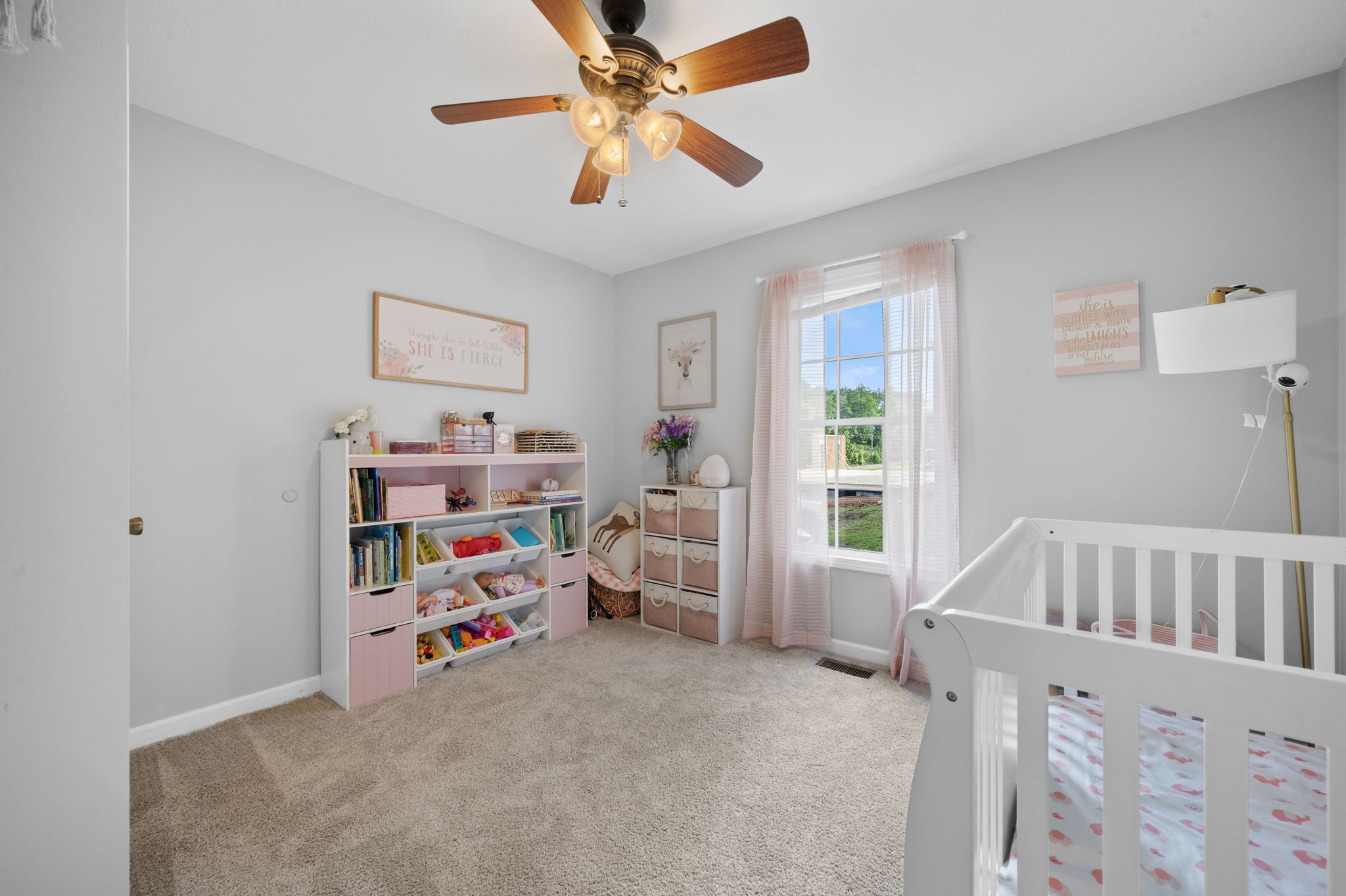 1197 Biter Road Cunningham, TN 37052 - Photo 21 of 38 a bedroom with furniture and a baby crib